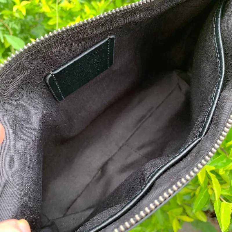 Coach Carryall Pouch In Signature Canvas (Black)