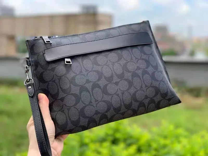 Coach Carryall Pouch In Signature Canvas (Black)