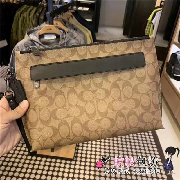 Coach Carryall Pouch In Signature Canvas (Tan)