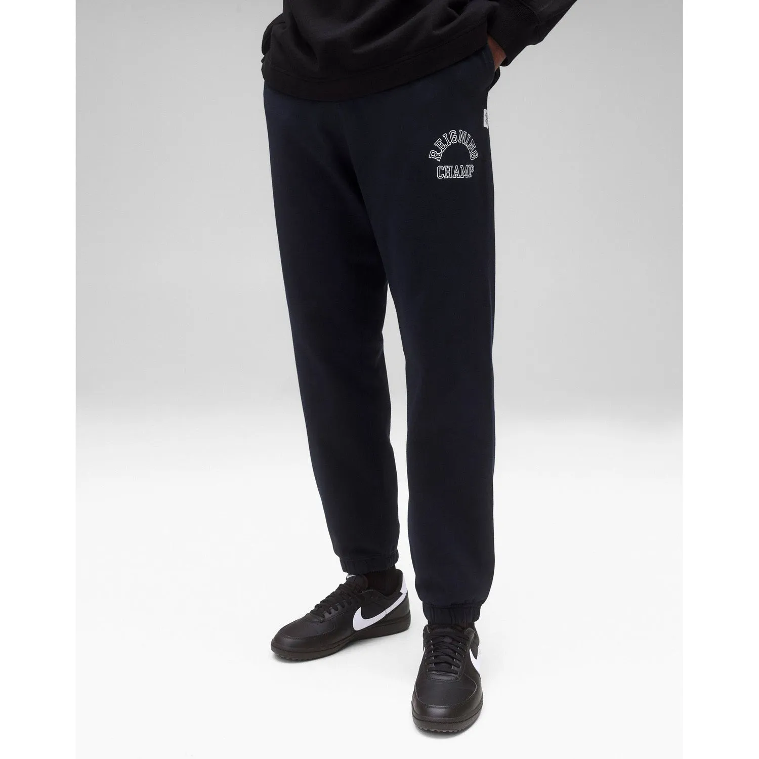 Reigning Champ Men Knit Midweight Terry Arch Logo Sweatpant Navy White