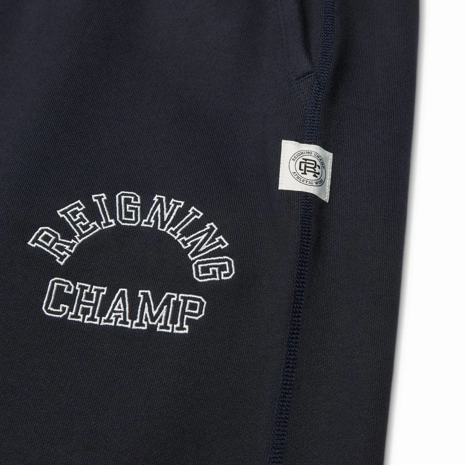 Reigning Champ Men Knit Midweight Terry Arch Logo Sweatpant Navy White